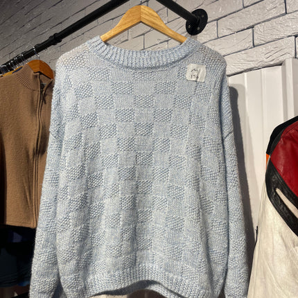 blue knitted sweater