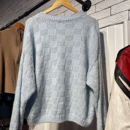 blue knitted sweater