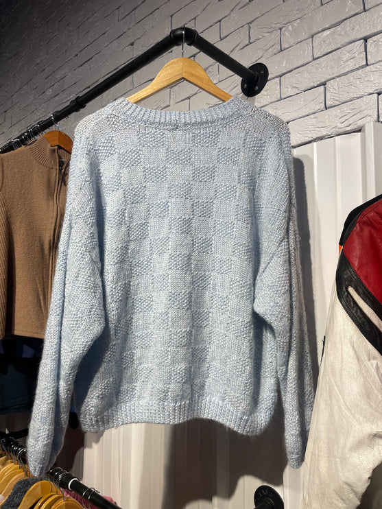 blue knitted sweater