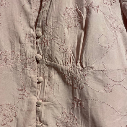 pink embroidered blouse