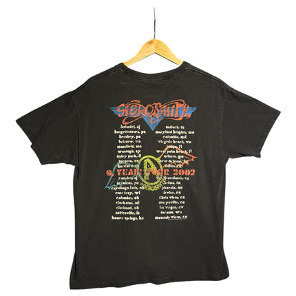OutOf10 black Aerosmith 2002 tour t-shirt with back graphic listing concert dates on a wooden hanger