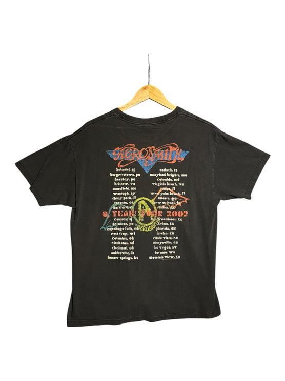 OutOf10 black Aerosmith 2002 tour t-shirt with back graphic listing concert dates on a wooden hanger
