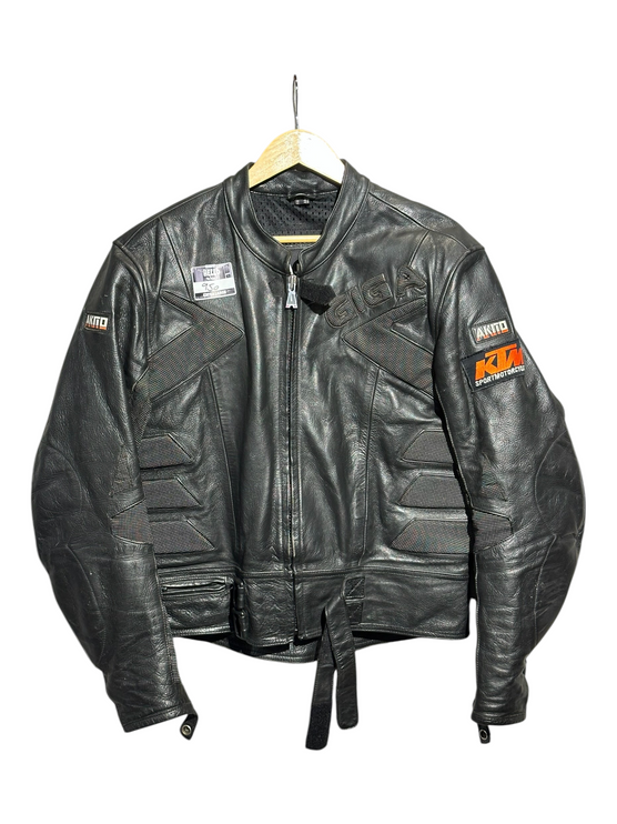 OutOf10 black AKITO leather motorcycle jacket with KTM branding, textured panels, and adjustable waist straps.