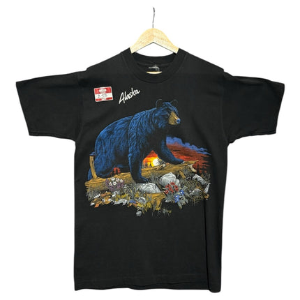 OutOf10 black cotton t-shirt featuring a vintage Alaska graphic with a black bear in a sunset landscape