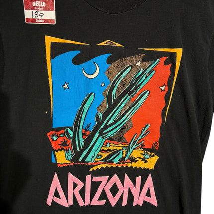 OutOf10 black cotton t-shirt featuring a vibrant retro Arizona desert graphic with a saguaro cactus and crescent moon.