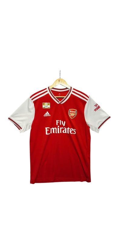 OutOf10 Arsenal home football jersey in red and white with club crest, Adidas branding, and sponsor logo on hanger.