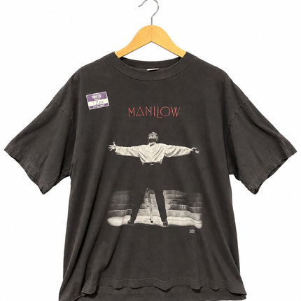 OutOf10 vintage washed-black cotton t-shirt featuring a Barry Manilow concert graphic and red text on the front.