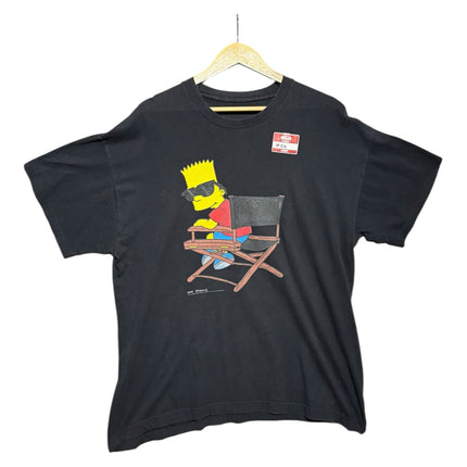 OutOf10 black cotton crew-neck t-shirt featuring a graphic print of Bart Simpson in a director's chair.
