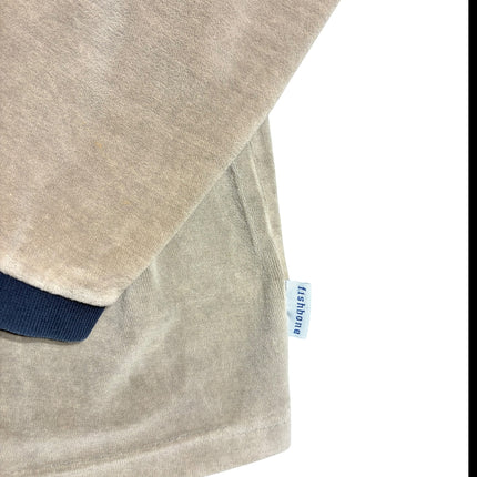 OutOf10 beige velour long sleeve sweatshirt featuring a navy ribbed cuff and a small Fishbone branded side tab.