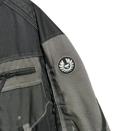 OutOf10 Belstaff motorcycle jacket in black and grey textile with iconic phoenix logo patch on the sleeve