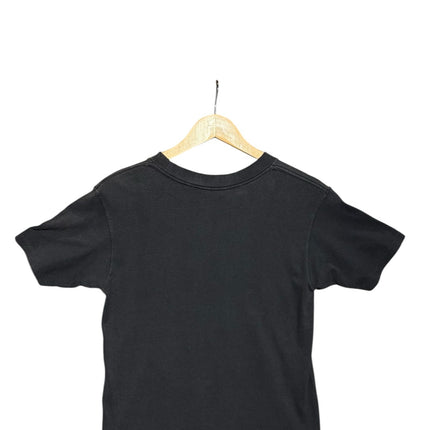 OutOf10 black cotton crewneck t-shirt viewed from the back on a wooden hanger
