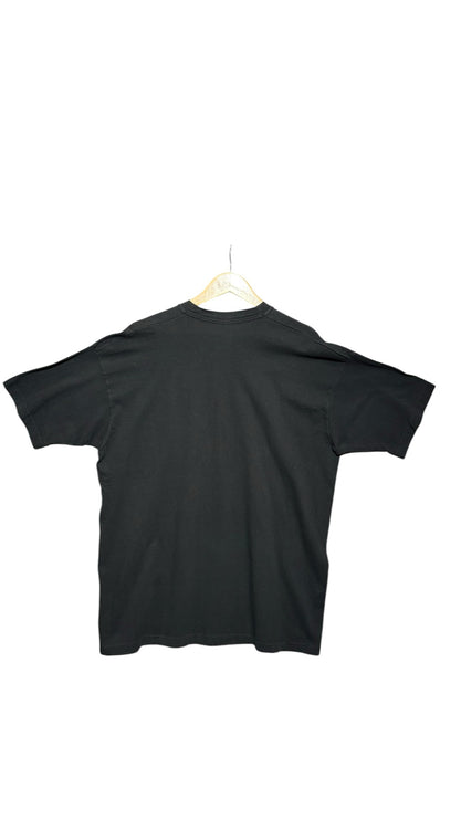 OutOf10 black crew-neck cotton t-shirt, back view of a plain vintage-style shirt on a wooden hanger.