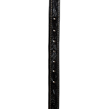 OutOf10 black leather belt with intricate floral embossing and a polished silver-tone tip for a Western-inspired look.