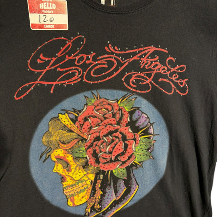 OutOf10 black cotton t-shirt featuring a vibrant skull and rose graphic with rhinestone accents and Los Angeles script
