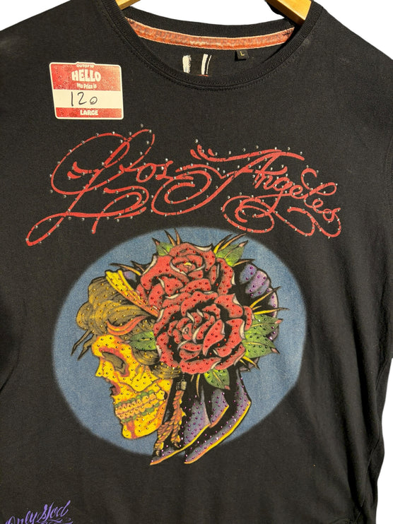 OutOf10 black cotton t-shirt featuring a vibrant skull and rose graphic with rhinestone accents and Los Angeles script