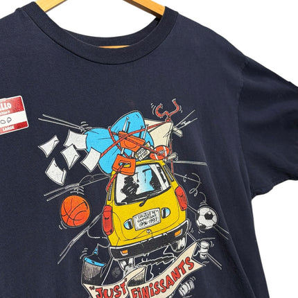 OutOf10 black cotton crewneck t-shirt featuring a vintage graphic of a packed yellow car and Just Finissants text