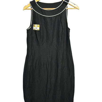 OutOf10 black sleeveless shift dress with white piping detail on neckline and armholes, linen and rayon blend.