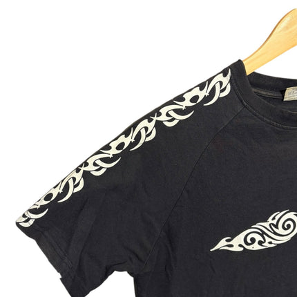 OutOf10 black cotton crewneck t-shirt with white tribal-inspired graphic print on the sleeve and chest.
