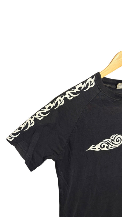 OutOf10 black cotton crewneck t-shirt with white tribal-inspired graphic print on the sleeve and chest.