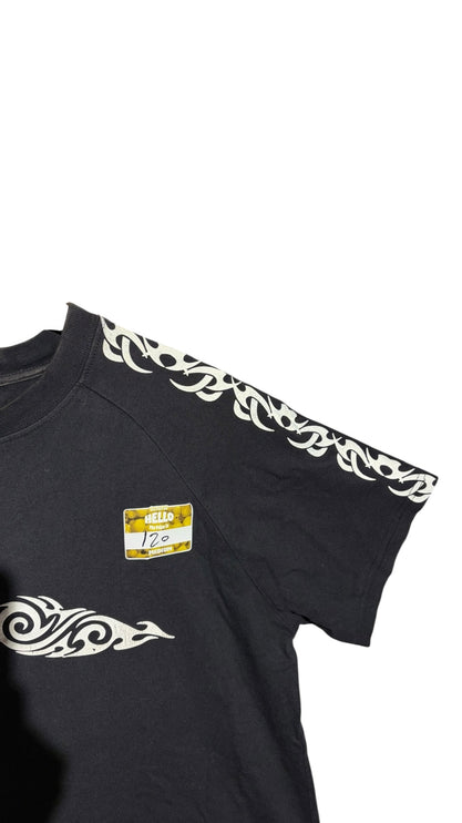 OutOf10 black cotton crewneck t-shirt featuring white tribal-inspired graphic prints along the shoulders and sleeves.