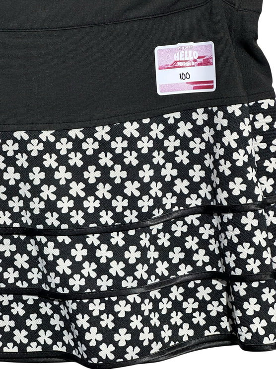 OutOf10 black and white tiered athletic skirt with a clover floral pattern and a wide comfortable waistband