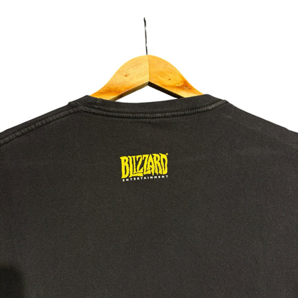 OutOf10 black crewneck t-shirt back view featuring a yellow Blizzard Entertainment logo on the nape