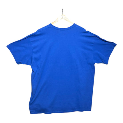 OutOf10 blue crew neck t-shirt viewed from the back, hanging on a wooden hanger against a plain white background.