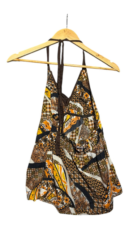 OutOf10 bohemian halter neck top featuring a vibrant geometric print in brown, orange, and cream with ruffle details.