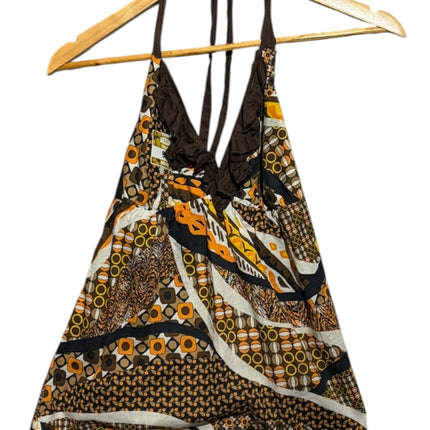 OutOf10 bohemian halter neck top with brown, orange, and cream geometric print and ruffle detail on a wooden hanger