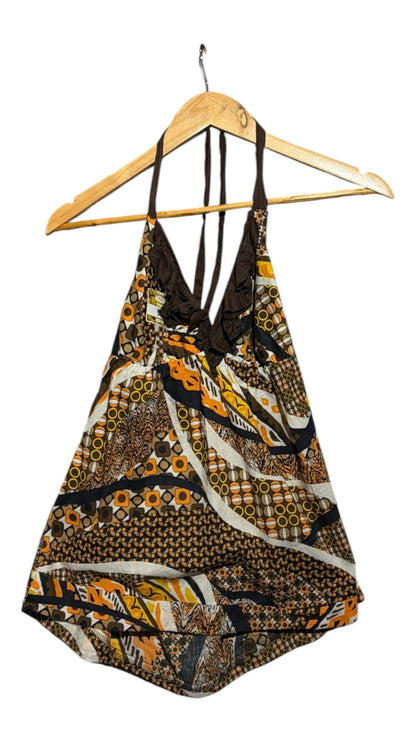 OutOf10 bohemian halter neck top with brown, orange, and cream geometric print and ruffle detail on a wooden hanger