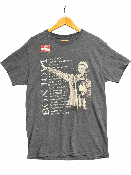 OutOf10 heather grey Bon Jovi graphic t-shirt with Jon Bon Jovi photo and song list on a wooden hanger