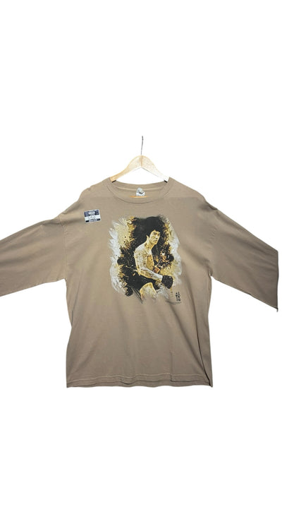 OutOf10 tan long sleeve t-shirt featuring a vintage-style Bruce Lee graphic print with artistic brushstroke details.