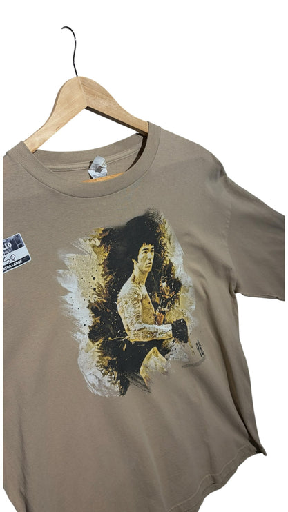OutOf10 tan long sleeve t-shirt featuring a vintage-style Bruce Lee graphic print with artistic brushstroke details.