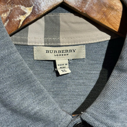 OutOf10 Burberry London grey long sleeve polo shirt featuring a signature check pattern collar and branded buttons.