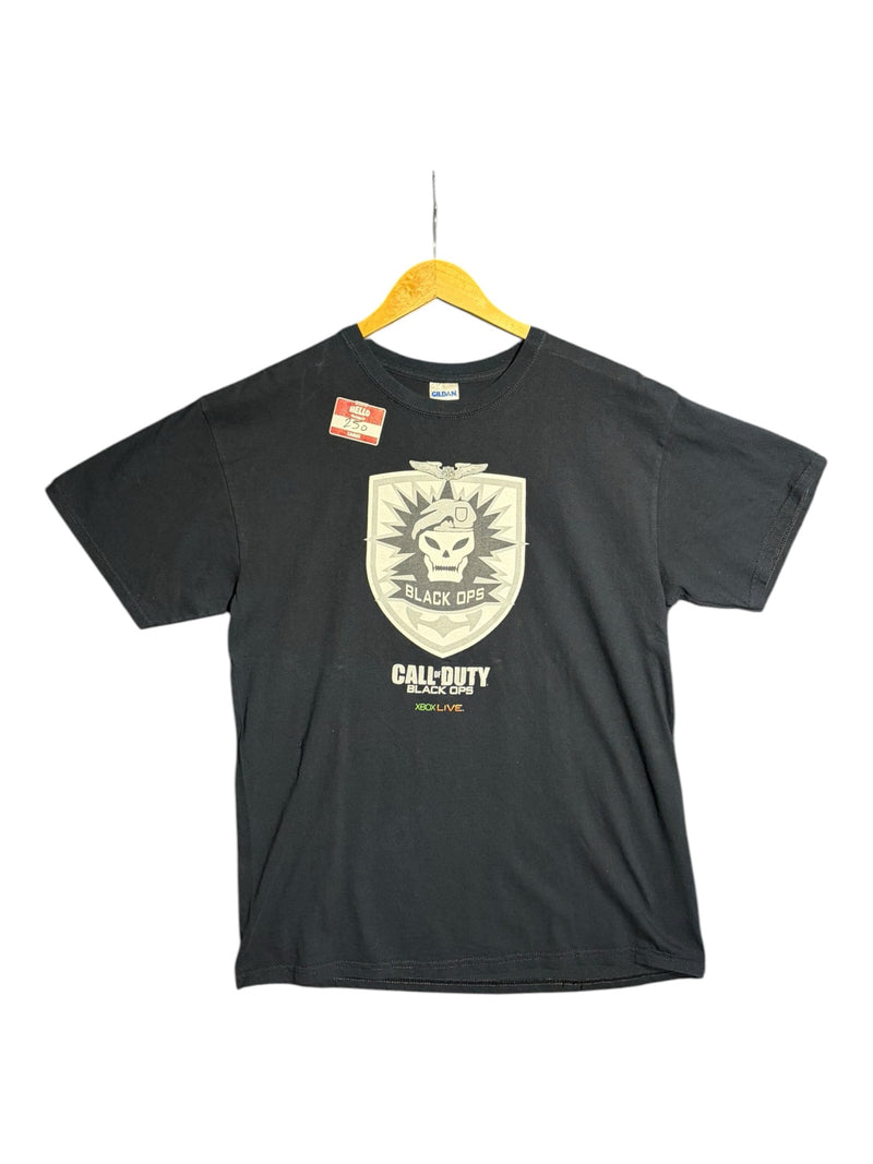 OutOf10 black cotton crewneck t-shirt featuring a Call of Duty Black Ops skull shield graphic print on the chest.