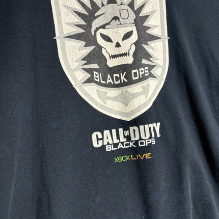 OutOf10 black cotton t-shirt featuring a distressed Call of Duty Black Ops skull emblem and Xbox Live logo print.