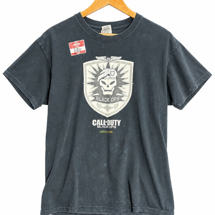 OutOf10 black Call of Duty Black Ops graphic cotton t-shirt with distressed skull emblem on a wooden hanger
