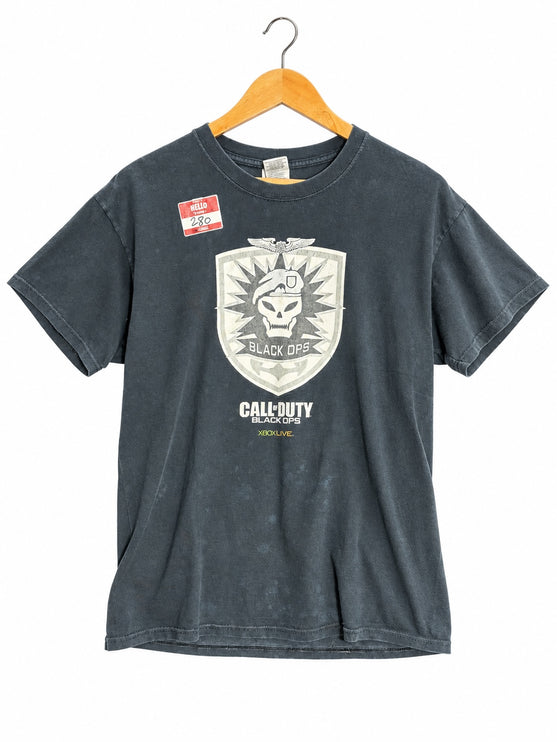 OutOf10 black Call of Duty Black Ops graphic cotton t-shirt with distressed skull emblem on a wooden hanger