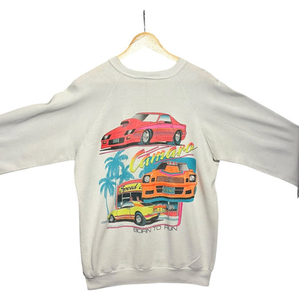 OutOf10 light grey crewneck sweatshirt featuring a vintage Camaro muscle car graphic with palm trees on the back