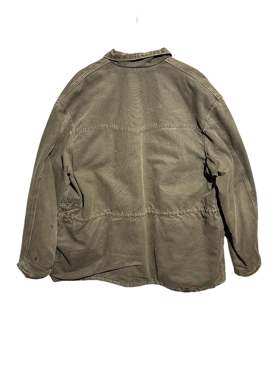 Back view of a vintage OutOf10 Carhartt brown cotton canvas field jacket with a drawstring waist and distressed finish.