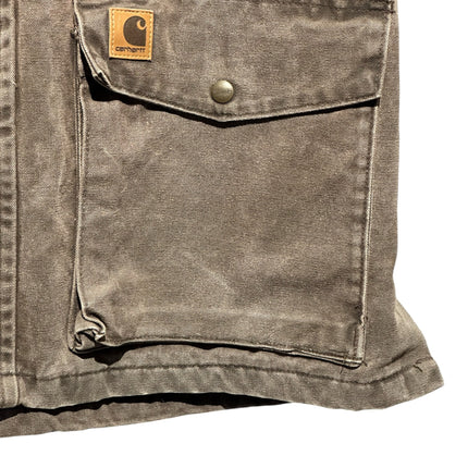 OutOf10 Carhartt brown rugged canvas field jacket featuring a large front pocket with a snap-button and logo patch