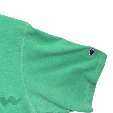 OutOf10 Champion green cotton t-shirt featuring a signature embroidered C logo patch on the short sleeve
