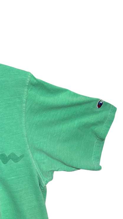 OutOf10 Champion green cotton t-shirt featuring a signature embroidered C logo patch on the short sleeve