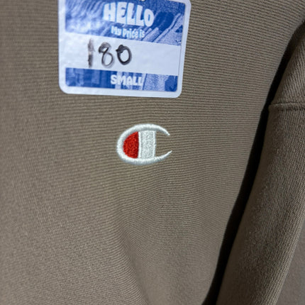 OutOf10 Champion taupe hoodie featuring an embroidered red and white logo on the chest with a price tag sticker