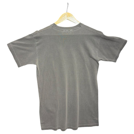 Back view of a charcoal grey OutOf10 cotton t-shirt with a classic crew neckline hanging on a wooden hanger.