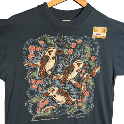 OutOf10 charcoal grey cotton t-shirt featuring Aboriginal dot-art of kookaburras and gum blossoms on a hanger