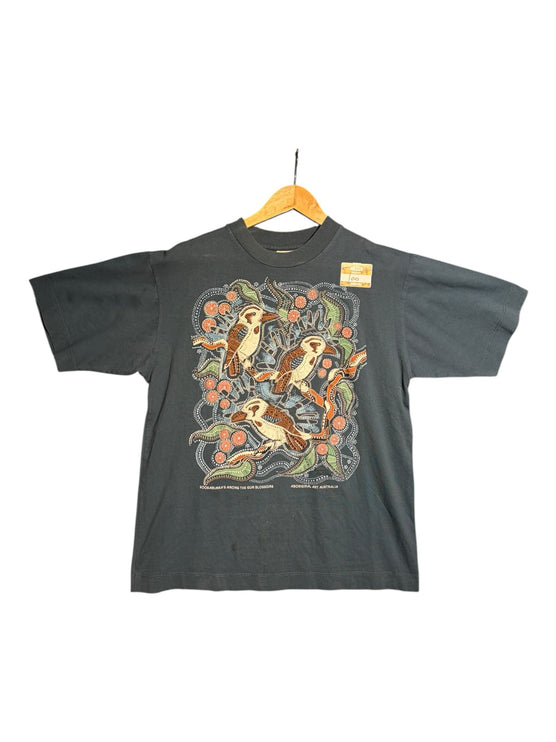 OutOf10 charcoal grey cotton t-shirt featuring Aboriginal dot art of kookaburras and gum blossoms on a hanger.