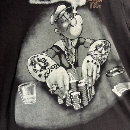 OutOf10 charcoal black cotton t-shirt featuring a vintage Popeye graphic print of him playing poker with tattoos.