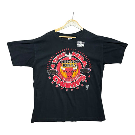 OutOf10 vintage black Chicago Bulls graphic t-shirt with red and yellow championship basketball team logo print.