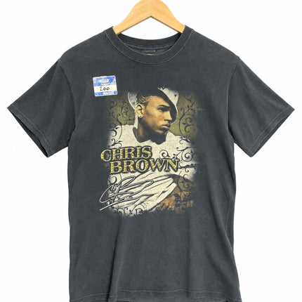 OutOf10 vintage-style black cotton crewneck t-shirt featuring a Chris Brown graphic print and signature on a hanger.